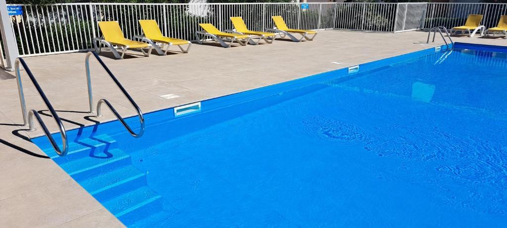 studio 3 couchages dans résidence avec piscine ouverte et place de parking, Le Barcarès