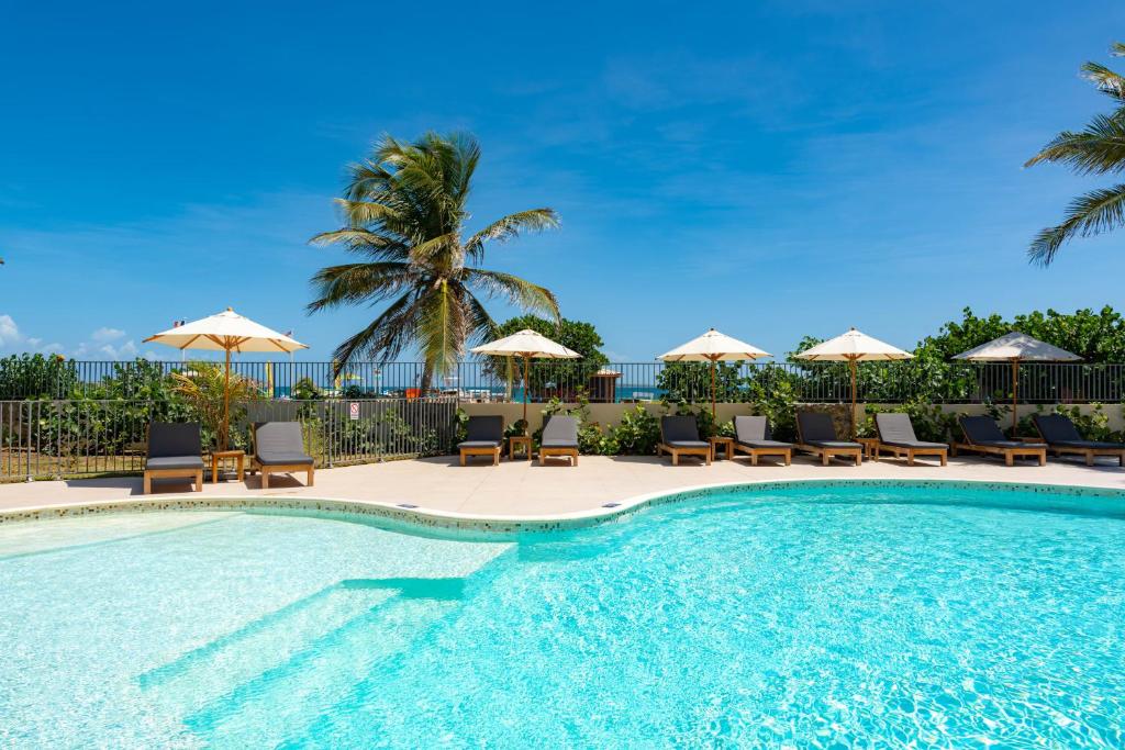 Large studio with beach and pool in Orient Bay, Orient Bay