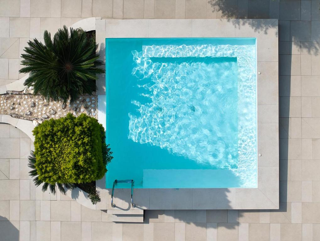 Glavas Inn Hotel — Swimming pool in Gerakini, Central Macedonia