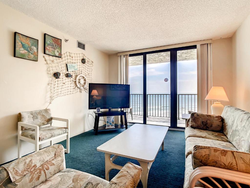 Ocean View with a beachfront pool at Ocean Trillium Condo ~ 603, New Smyrna Beach