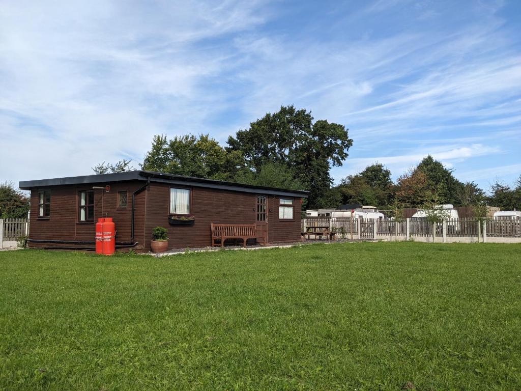 Log cabin with secure garden, Haxey
