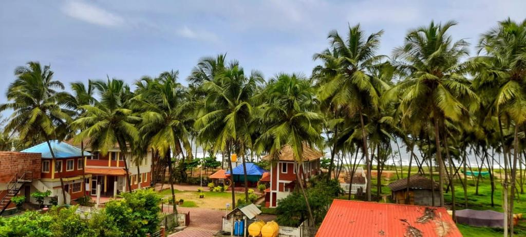 Glucklich Beach Cottages의 해변 전망 이미지입니다.