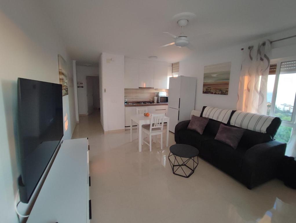 Hercules Paradise 531 - Mediterranean Sea View Terrace - Resort Pools & Gardens - 10 Min Beach - Central Benalmadena - Direct Train to Airport & Malaga - Fast Private WiFi - Remote Work and FireTV ready - 2