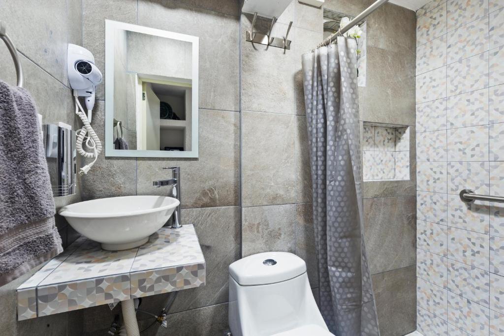 Casa Nance Alojamientos XAMAN HÁ Centro Mercado 28 y ADO Suite Familiar 3 Personas - 4