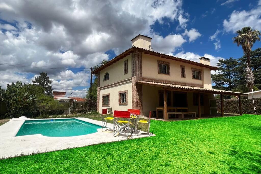 Cosquín Casa a metros del río con pileta - Hasta 12 personas - 1