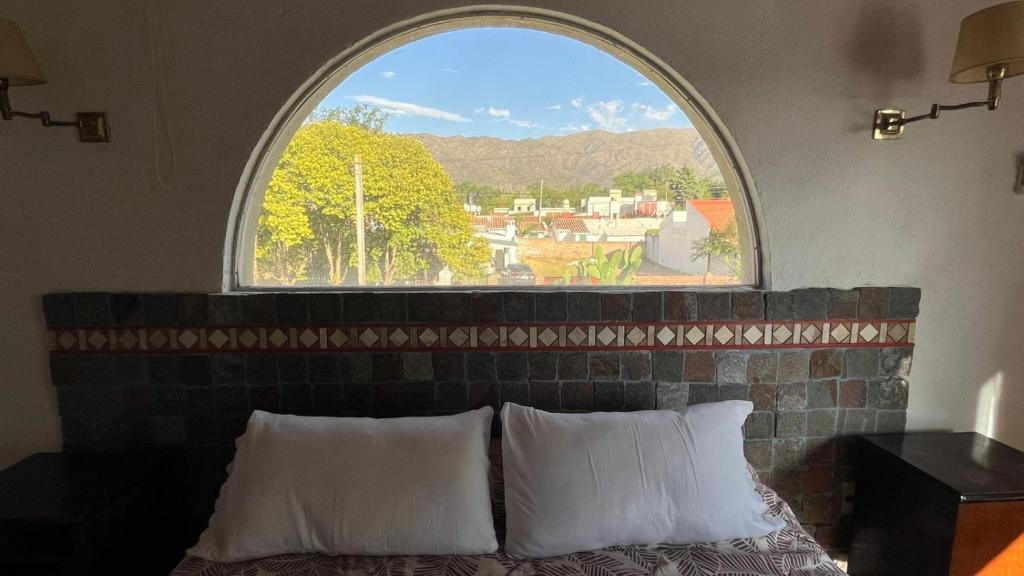 Cosquín Casa a metros del río con pileta - Hasta 12 personas - 2