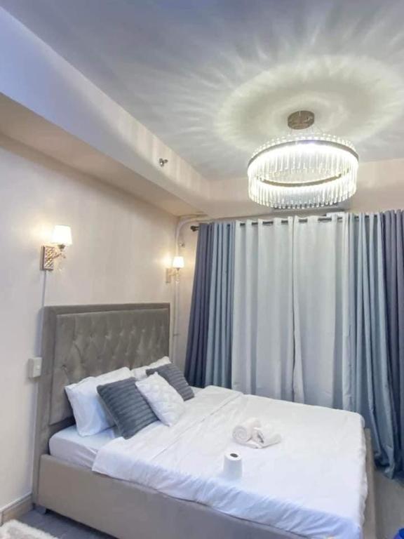 Grace Residences Elevate Escapes - near BGC airport, Manila
