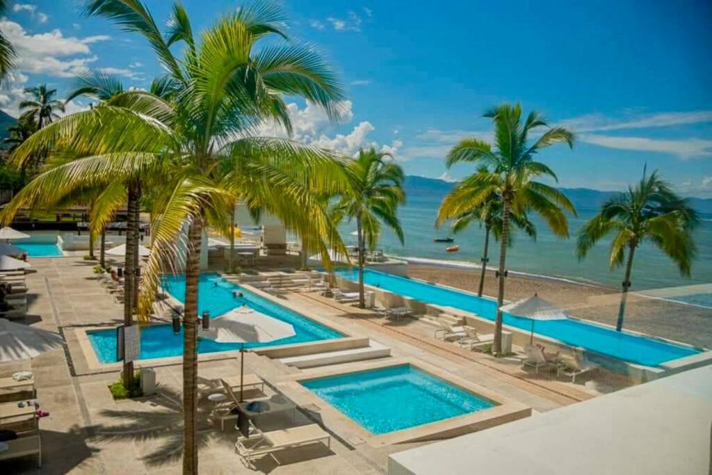 Harbor 13008A Artistic beachfront studio by Moikkarentals, Puerto Vallarta