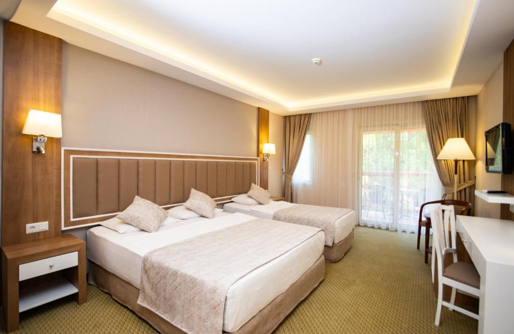 Kustur Club Holiday Village - All Inclusive — Hotel rooms in Kuşadası, Aydin