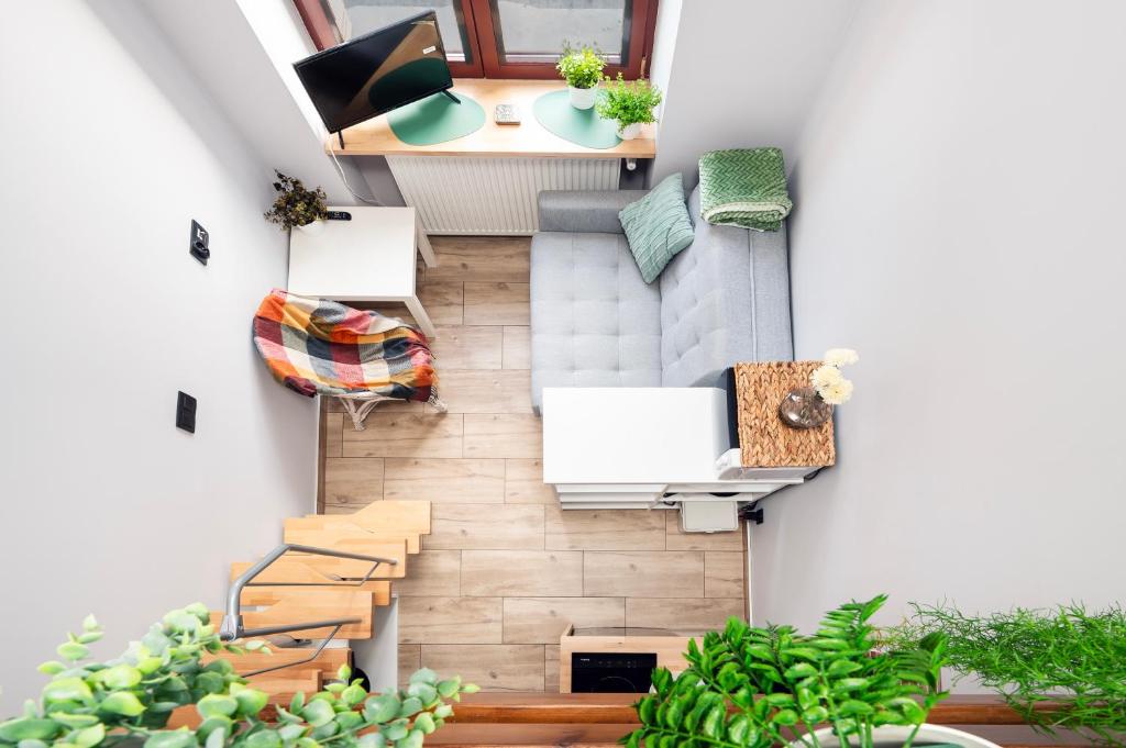 Piotrkowska Studio with Mezzanine by BookingHost, Lodž