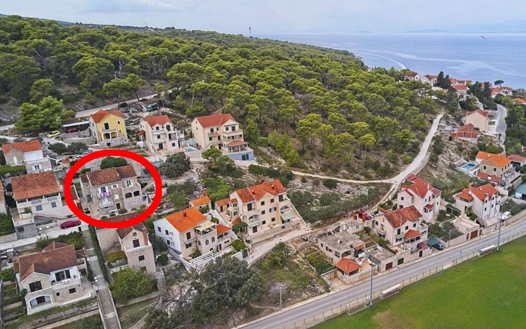 Apartments with parking spaces Postira, Brac - 22150, Postira