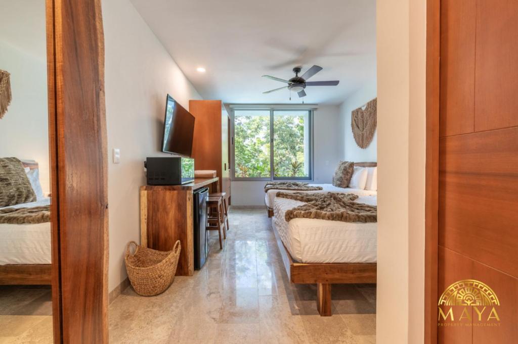 NHOA 211C Lux 1BR Condo Pool View in Aldea Zama - 1