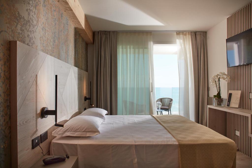 Deluxe szoba 1 kétszemélyes vagy 2 külön ággyal - kilátással a tengerre