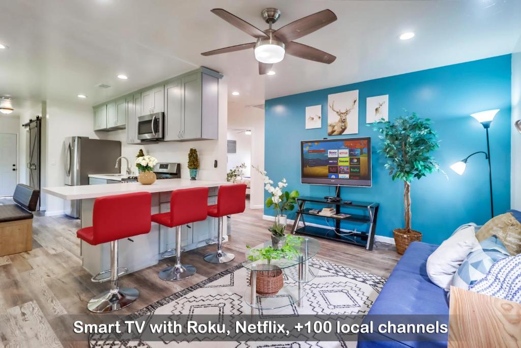 Entire Modern 3-Bedroom Family Home w Spacious Fenced Yard & Free Parking in Prime Location