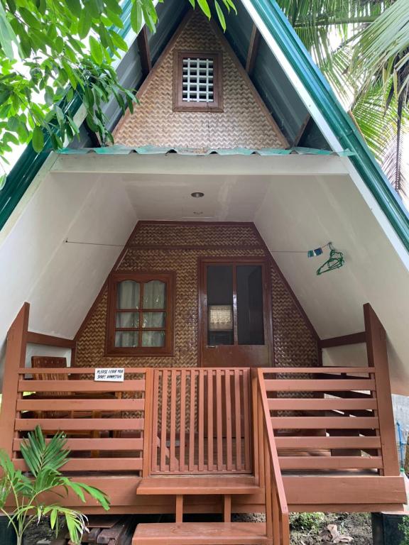 Divinagracia Cottages, San Vicente