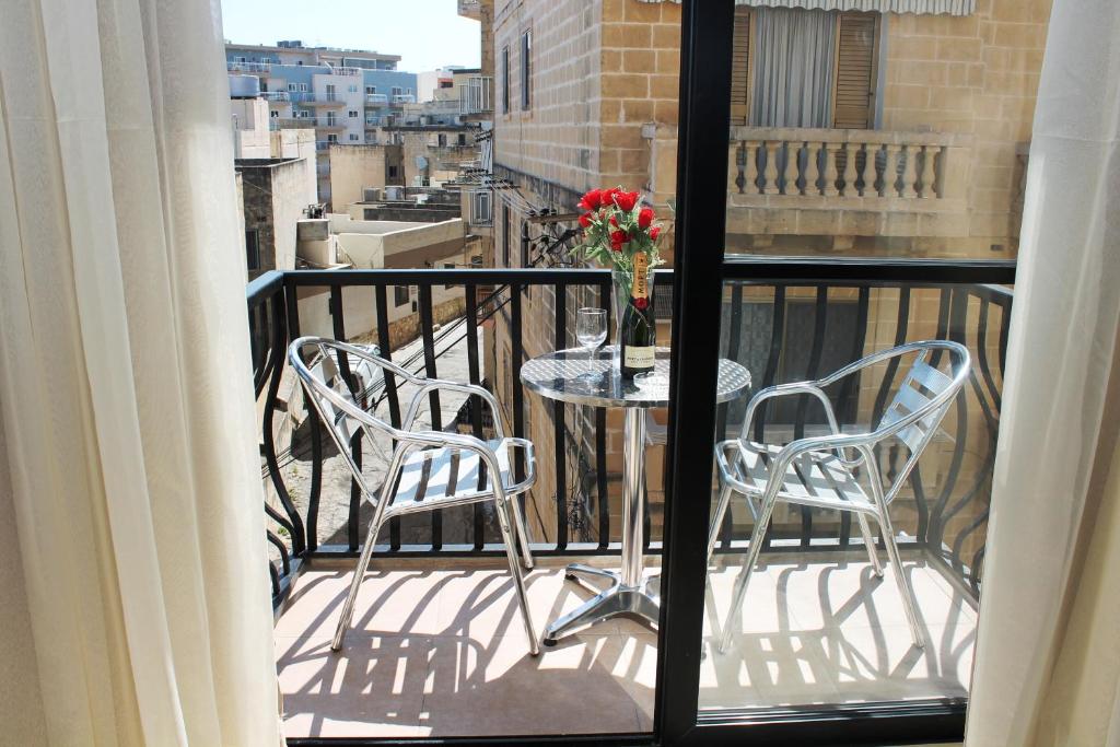 Seashells Apartments with terrace, just off the seafront in Bugibba - by Getawaysmalta photo