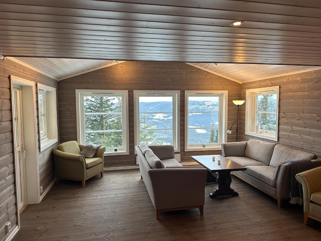 Alpinly - cabin with panoramic view and ski in& ski out