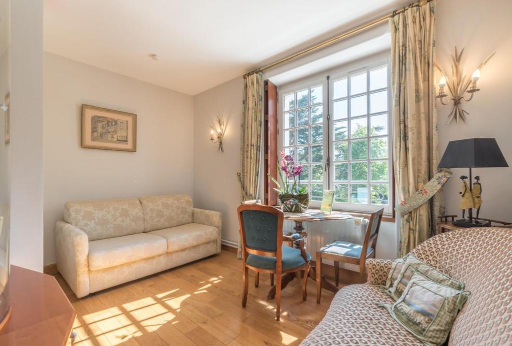 Manoir de l'Espérance 共用ラウンジ/TVエリア