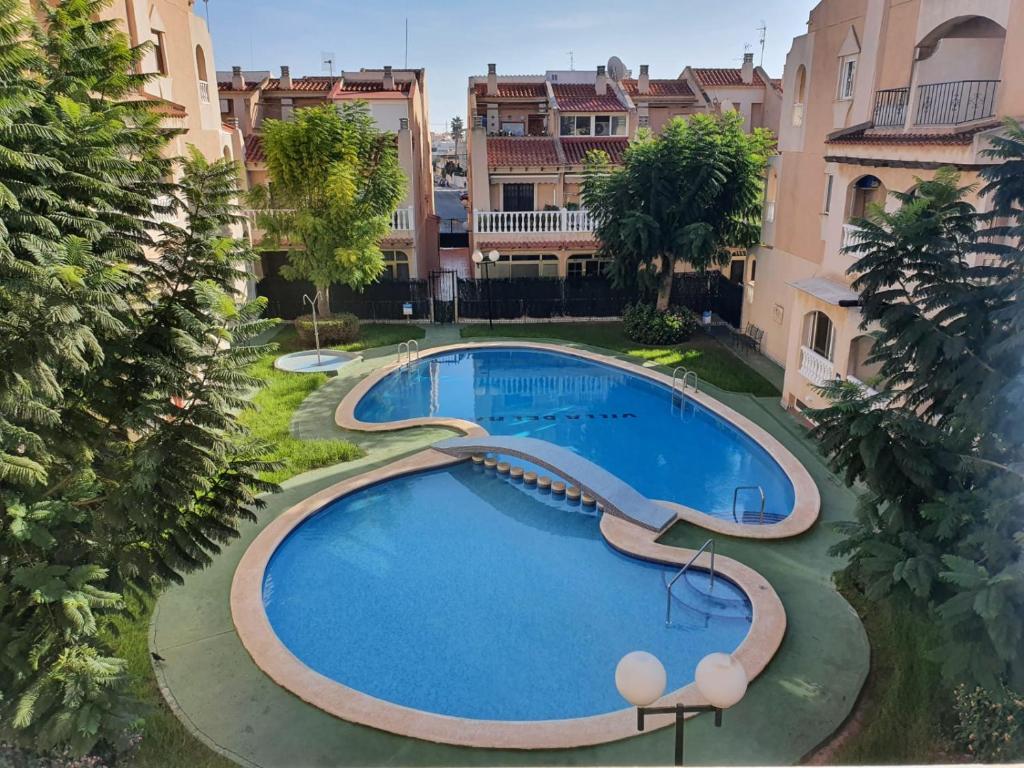 Apartment with pool & balcony less than 10min walk to Playa del Cura, Torrevieja