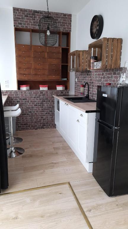 Gîte location meublée Aumale - studio en centre-ville - La maison en brique