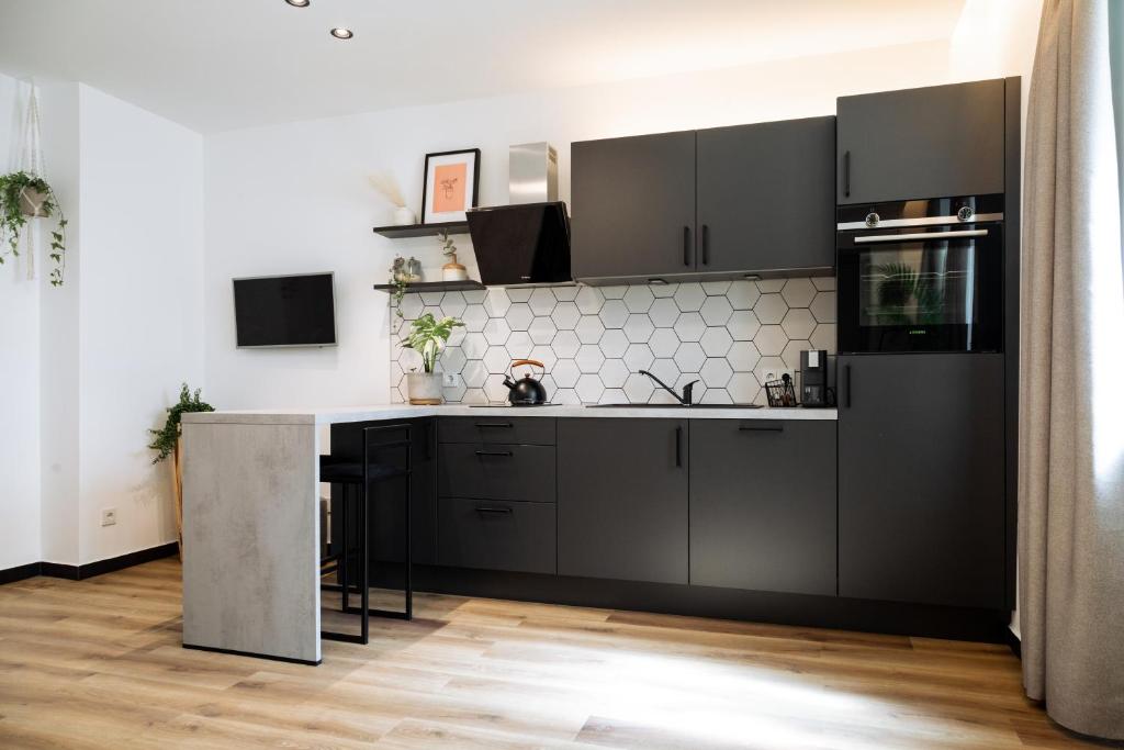 Kitchen, Urban Jungle Apartments  in Vienna