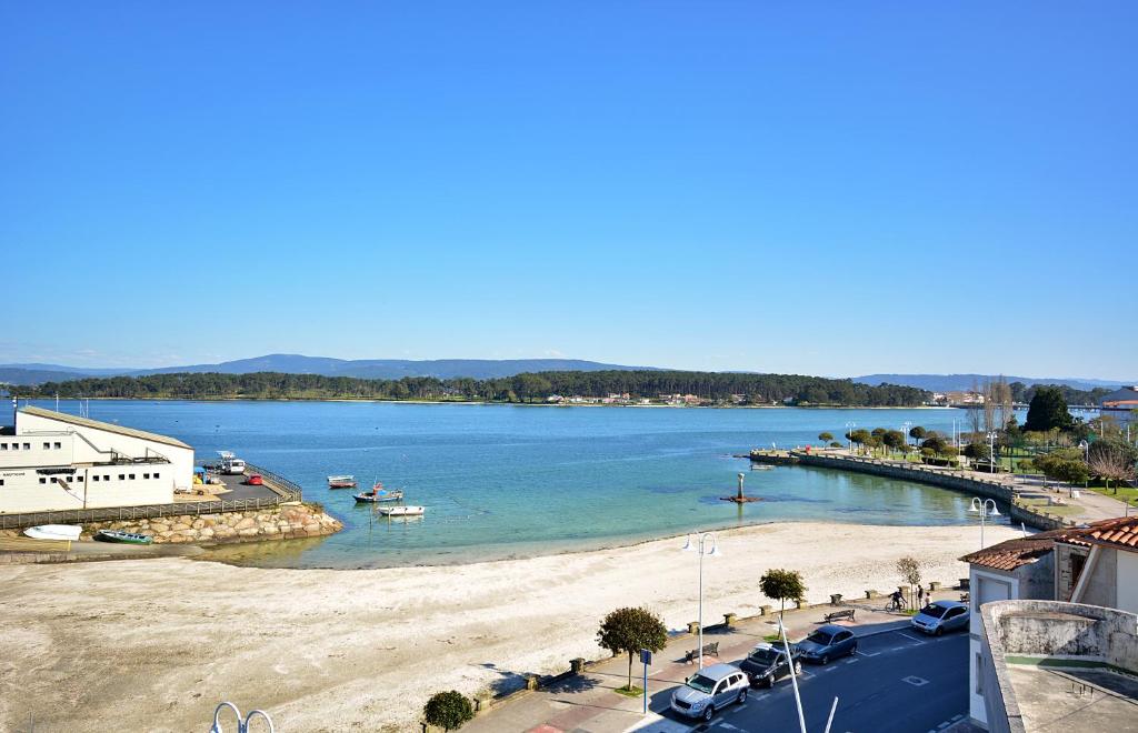 Apartamento con terraza frente al mar en O Grove - 1