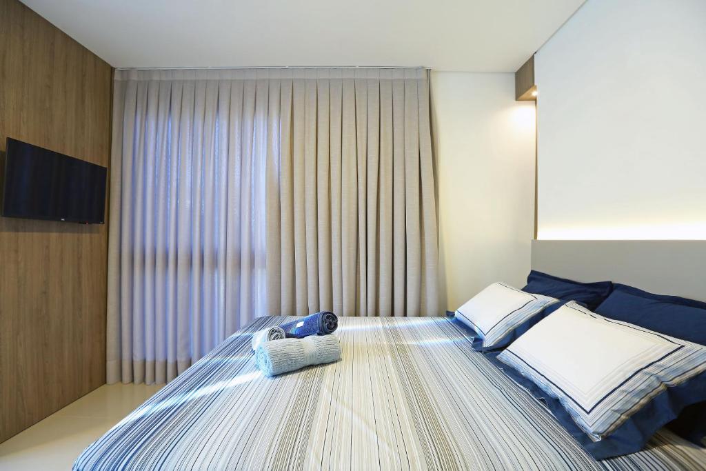 Cobertura Duplex no Campeche Florianópolis, 2 quartos com ar-condicionado, 3 banheiros, WiFi 1Gb, Cozinha completa, Estacionamento, Amplo terraço coberto com churrasqueira, Florianópolis