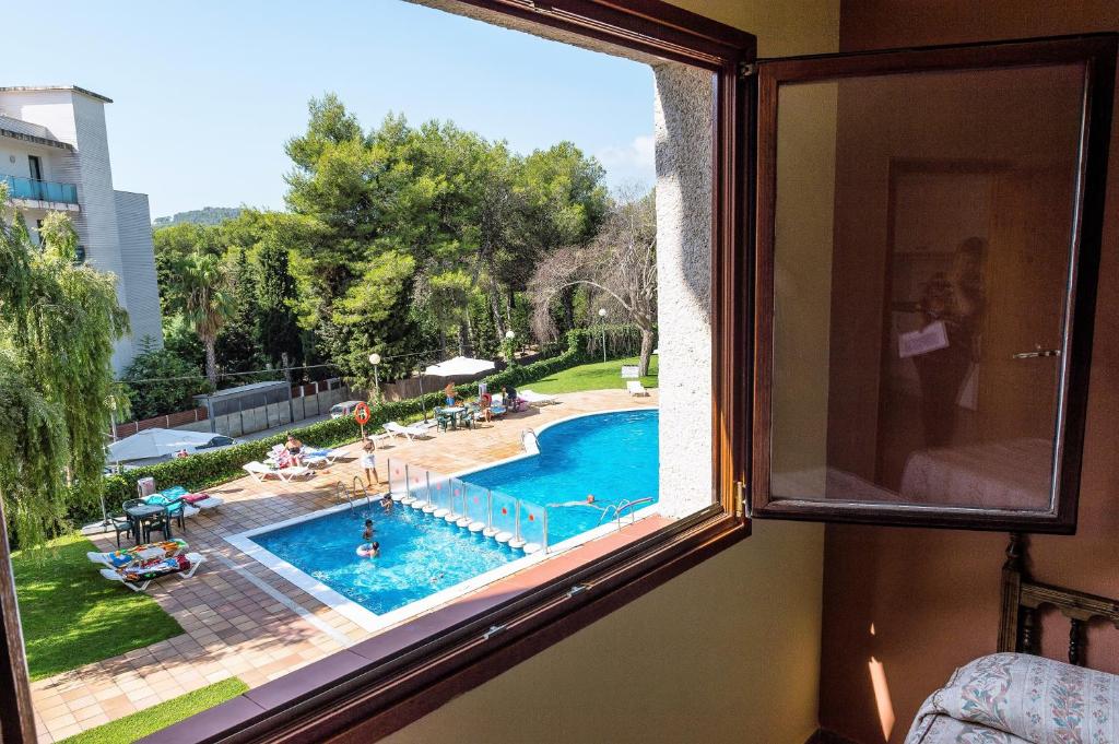 Aparthotel Las Mariposas — Swimming pool in Lloret de Mar, Catalonia