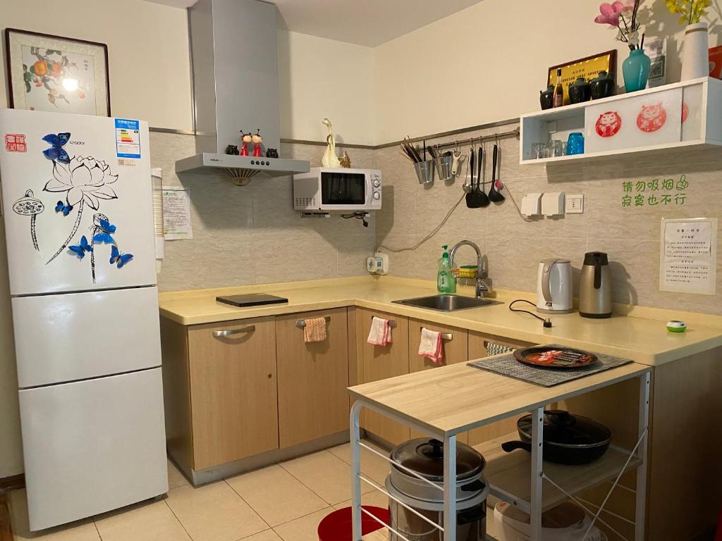 Kitchen, 古北水镇瑶筑小舍Gubei Shui Town Yaozhu Little Guest House in Beijing