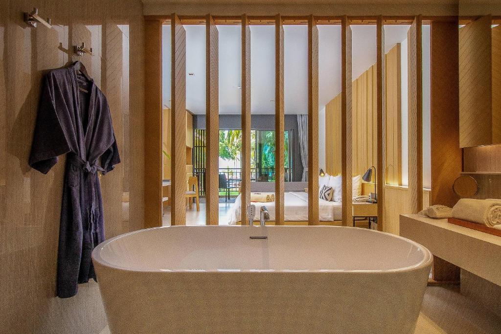 Bathroom, Ramada Resort by Wyndham Khao Lak in Khao Lak