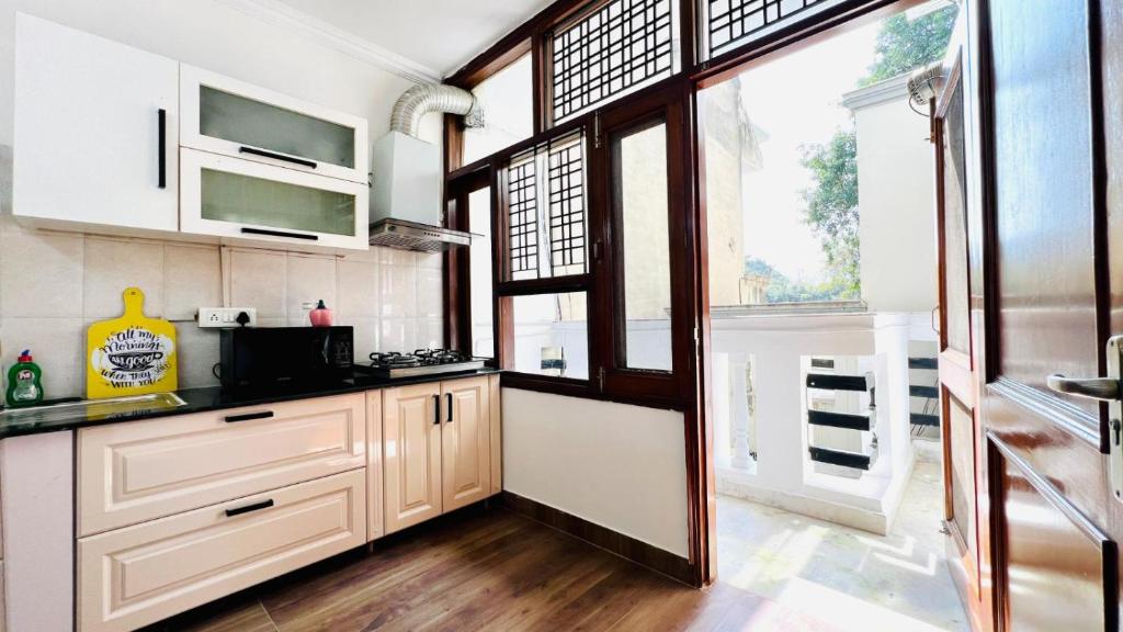 Kitchen, Olive Service Apartments Gurgaon-Sushant Lok in New Delhi and NCR