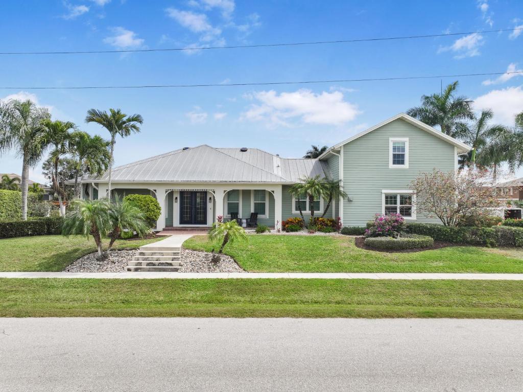 Coastal two-story home on water with pool/dock, Marco Island