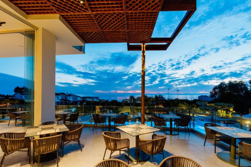 Elegant room or balcony view at Cavo Zoe Seaside Hotel