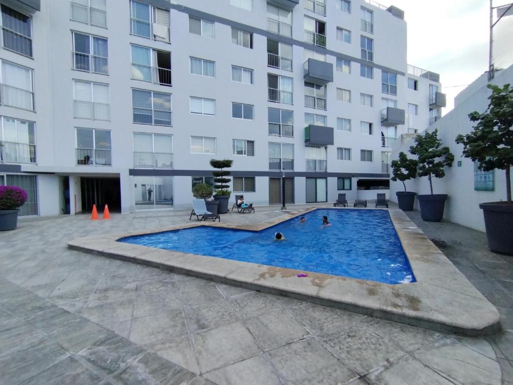 Céntrico y estiloso apartamento con Alberca, AC, Seguridad, Aparcamiento y Gym - 5