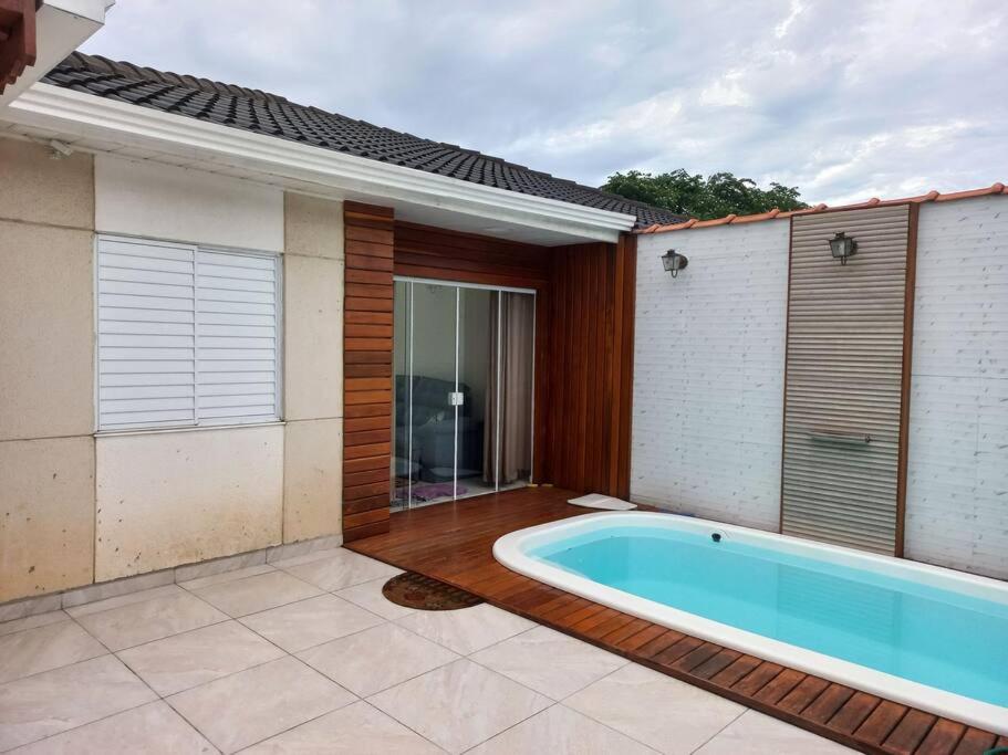 Casa charmosa com piscina, Guarujá