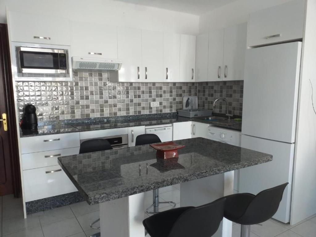 Bungalow Playa Bastian - Piscina climatizada - Wifi - Playa 1 min. - 2