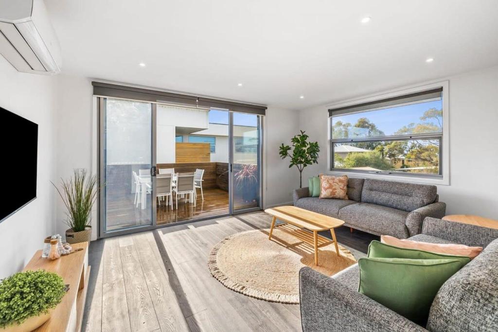 A wave from it all ocean glimpse central Torquay, Torquay