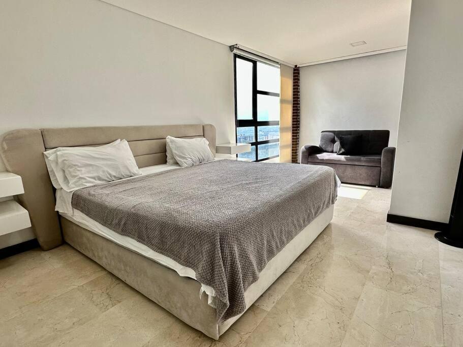702 Beautiful and spacious apartment in El Poblado, Медельин