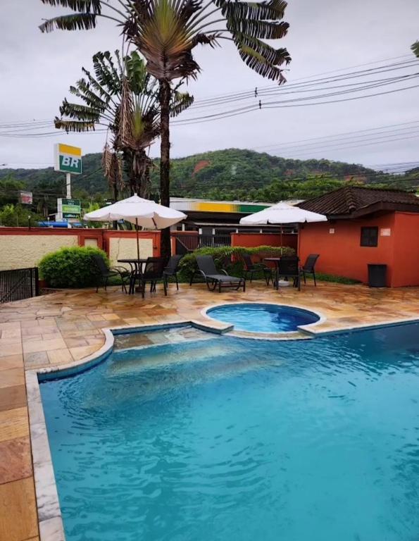 Flat em Juquehy - Condomínio com portaria e com piscina próximo praia, São Sebastião
