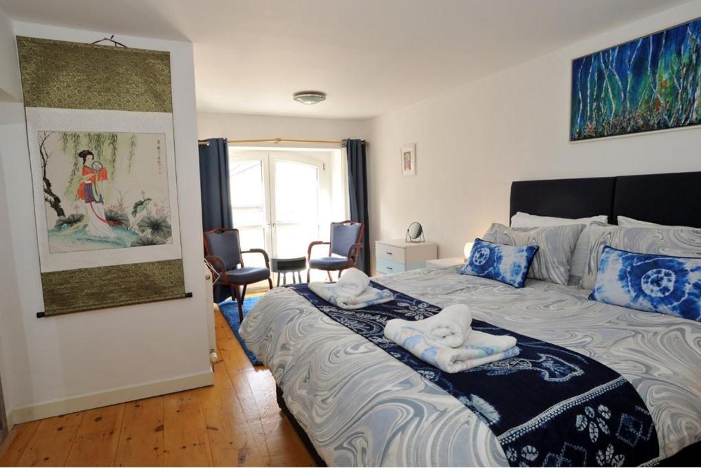 Mary Lyth - Whitby West Cliff with parking, Whitby