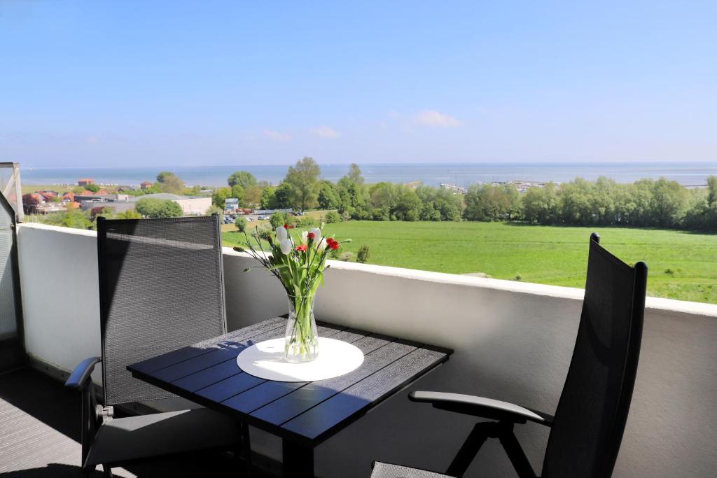 Meerblick D9 mit Balkon und Schwimmbad, Wangerland