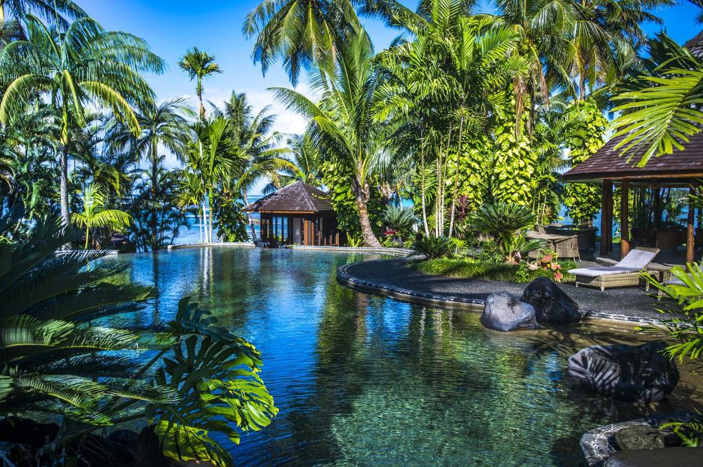 Swimming pool, Sinalei Reef Resort and Spa in Siumu
