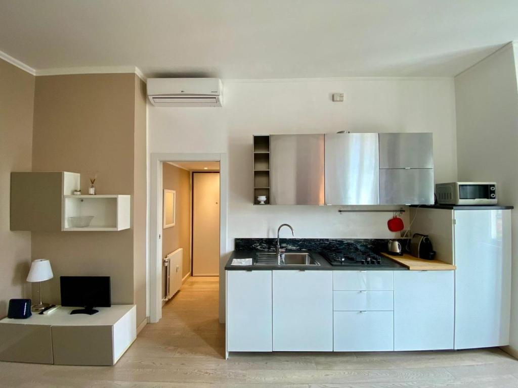 GuestHost - Piazzale Susa Bright Flat con Veranda - 2