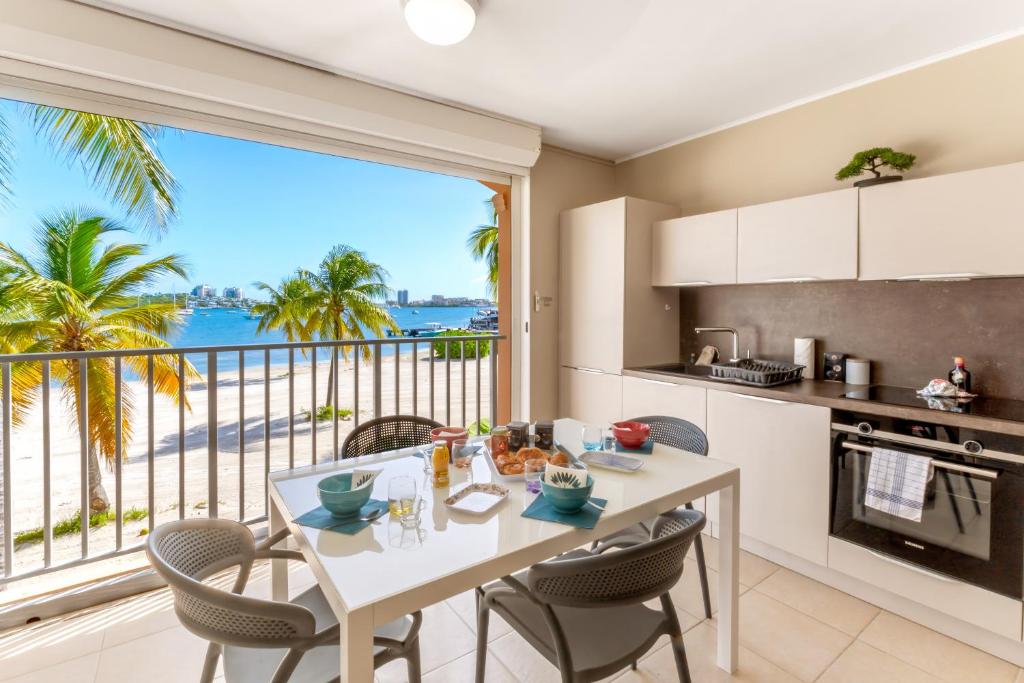 Vue imprenable sur le lagon, appartement 1ch 4p, Baie Nettle