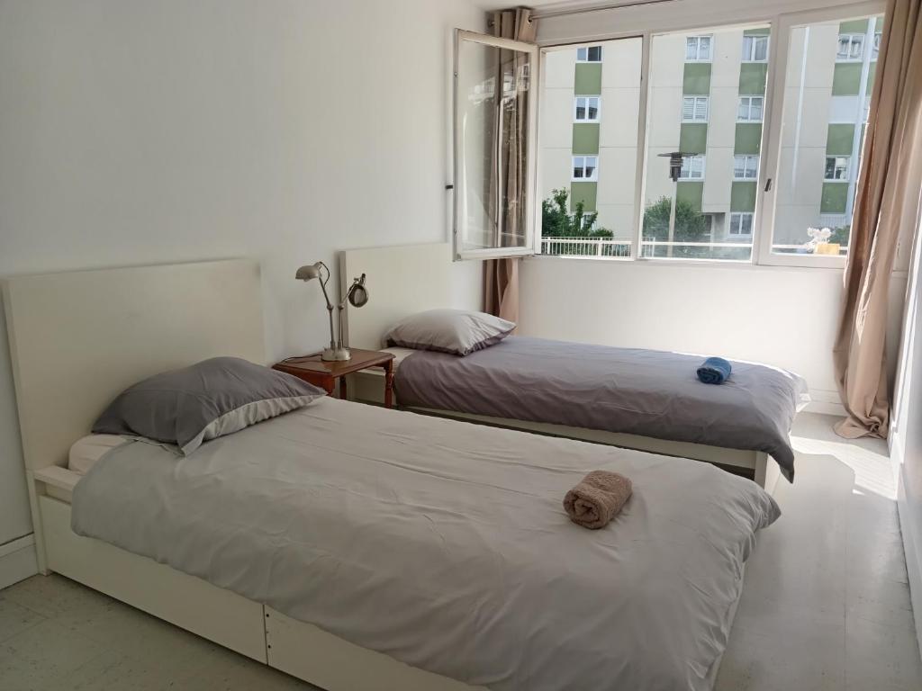 Chambres COSY PARIS CENTRE au Pied du metro, Paryż