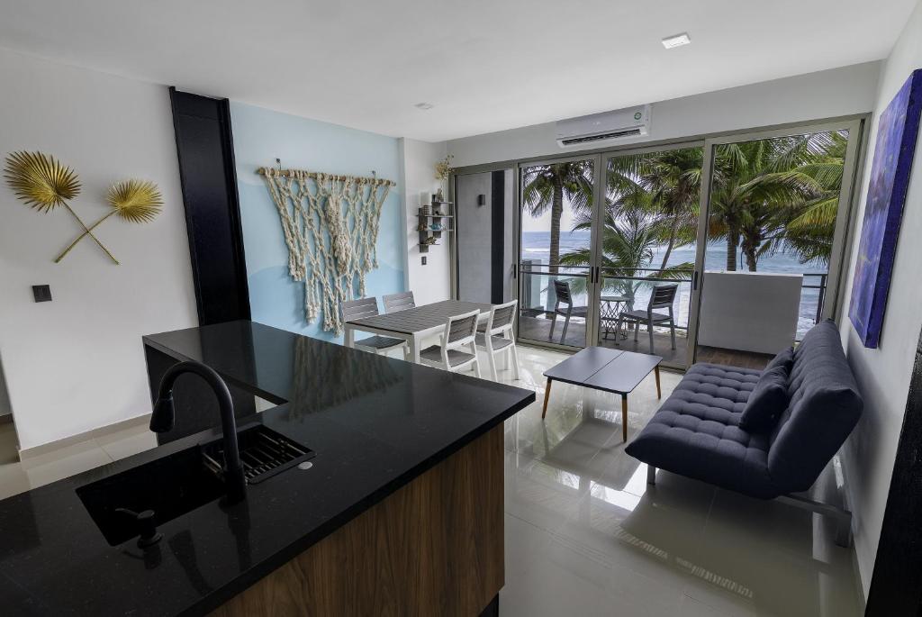 Angelina 28 Beachfront and Family Apartments - Modern and Relaxing Long Stays - 20 min from Cancun Airport - 5