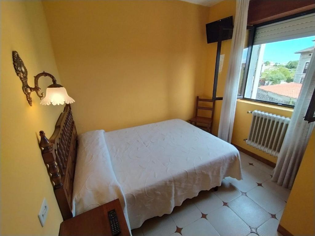 El Castañu de Cué, Cue