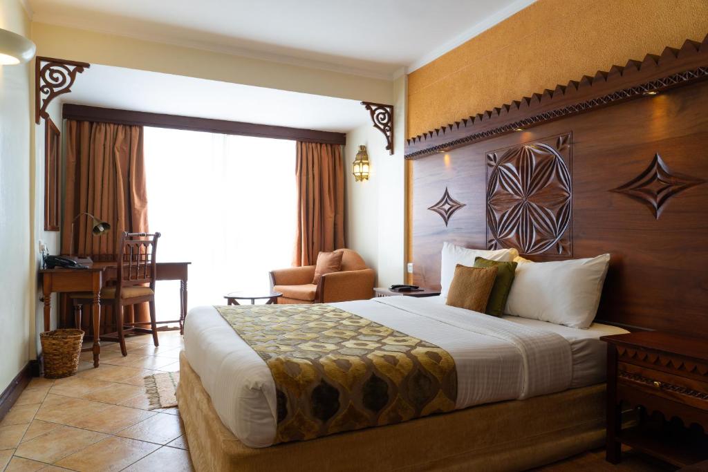 Nairobi The Heron By Sarovar Portico India room