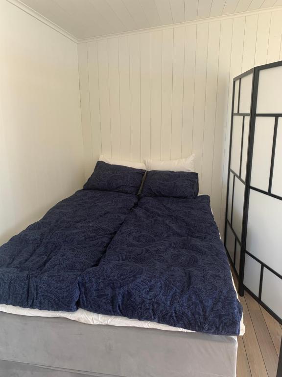 Bryggstuga med privat bastu