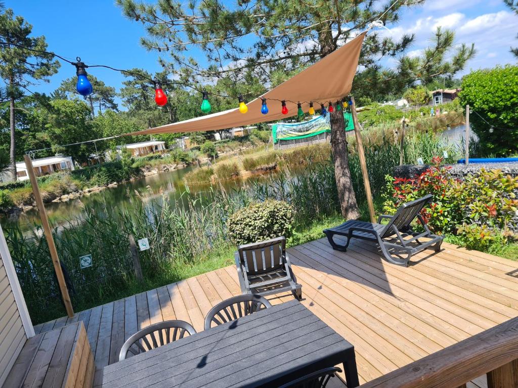 Mobil home avec terrasse - proche plages Cap-Ferret - 4-6 pers Camping 4 étoiles Les Viviers - 2